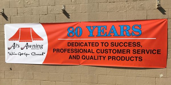 Banner celebrating 80 years of dedication to customers and quality products.